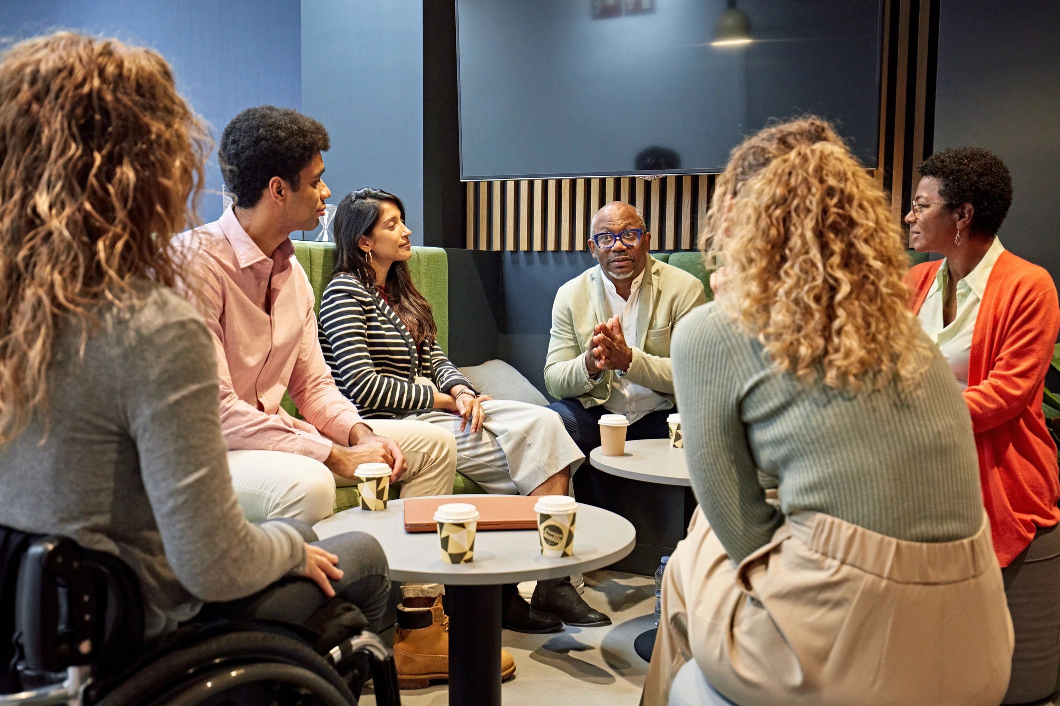 Diverse team discussing policy planning
